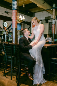 bride and groom in a bar